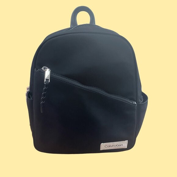 ✨ Calvin Klein Mini Backpack – Sleek Black Nylon with Silver Accents ✨ - Picture 2 of 7